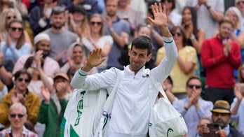 Djokovic wins at Wimbledon for 50th major quarterfinal berth