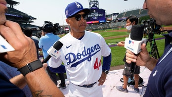 Injury-plagued Dodgers keeping close in bid to repeat title