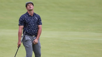 DeChambeau apologizes after blaming driver for British bomb