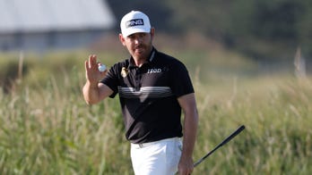 Oosthuizen sets 36-hole Open record, stellar cast behind him