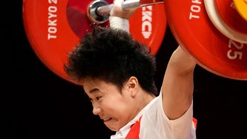 China slams media for 'ugly' photo of Olympic gold medalist Hou Zhihui