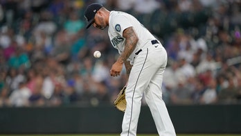 Mariners' Santiago banned 80 games for positive drug test