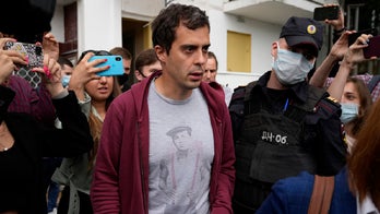 Russian authorities seek to detain prominent journalist