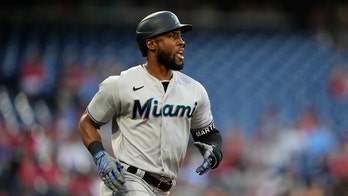 Marlins trade OF Marte to A's and RHP García to Astros