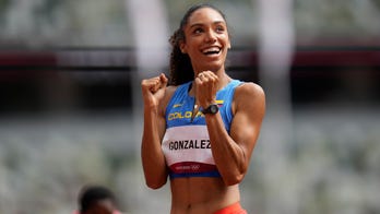 Lions go wild watching quarterback's wife in Olympic run