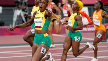 Thompson-Herah breaks Flo Jo’s Olympic record in women’s 100