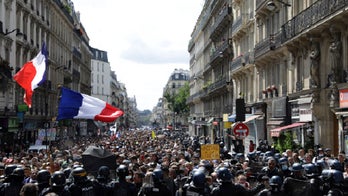 French police clash with anti-virus pass protesters in Paris
