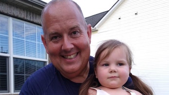 Off-duty police officer rescues neighboring 2-year-old from drowning after hearing screams five doors down