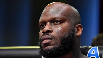 UFC star Derrick Lewis tosses head-scratching first pitch before Astros game
