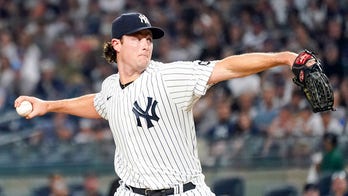 Cole, Yankees withstand rain to beat Red Sox 3-1