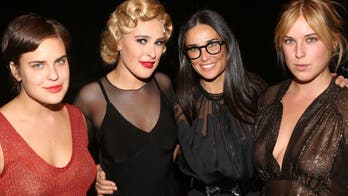 Demi Moore and her three daughters model matching swimwear