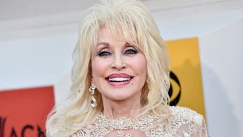 Dolly Parton recreates iconic Playboy cover shoot for husband's birthday: 'He still thinks I'm a hot chick'