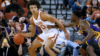 NBA Draft prospect Jericho Sims appears to hit his eye on rim while dunking