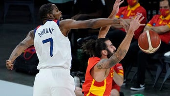 Short-handed US basketball roster off to Tokyo