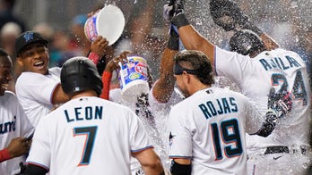 Aguilar's 3-run HR in 9th sends Marlins past Dodgers 9-6
