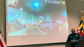 Video shows man moving in car before police fatally shot him