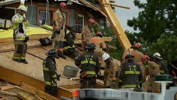 Washington, DC building collapse leaves several injured amid storm, firefighters rescue man from rubble