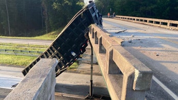 Dump truck hits bridge so hard it moves 6 feet