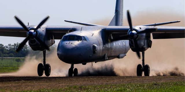 FILE 2018: An Antonov An-26 military transport aircraft during exercises held by the 4th Air and Air Defence Forces Army of the Russian Southern Military District. A similar passenger plane is reportedly missing. Photo by Valery Matytsin TASS via Getty Images)