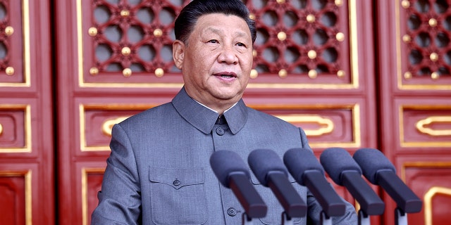 In this photo provided by China's Xinhua News Agency, Chinese President and party leader Xi Jinping delivers a speech at a ceremony marking the centenary of the ruling Communist Party in Beijing. (Ju Peng/Xinhua via AP)