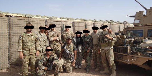 Moneer with Green Beret team members in 2010.