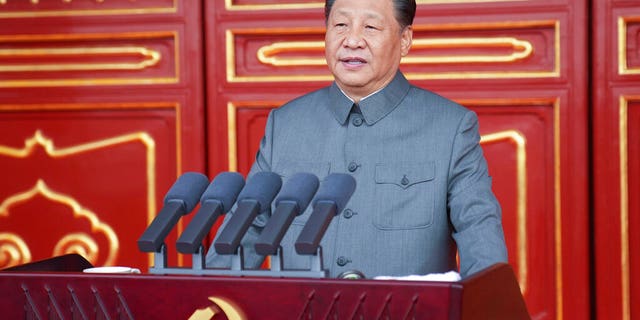 In this photo provided by China's Xinhua News Agency, Chinese President and party leader Xi Jinping delivers a speech at a ceremony marking the centenary of the ruling Communist Party in Beijing, China, Thursday, July 1, 2021. (Li Xueren/Xinhua via AP)