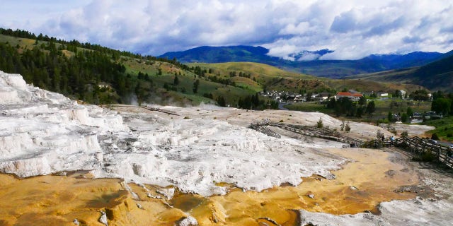 This June 17, 2017 image shows Mammoth Hot Springs in Yellowstone National Park in Wyo. (Matt Dahlseid/Santa Fe New Mexican via AP)