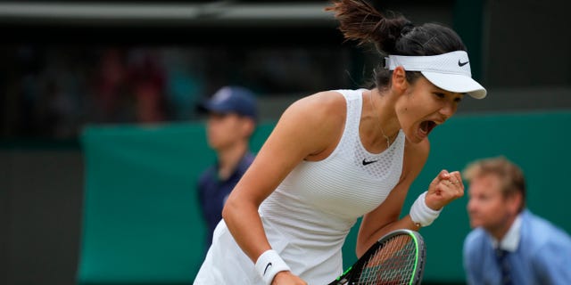Britain's Emma Raducanu celebrates winning a point against Romania's Sorana Cirstea during the women's singles third round match on day six of the Wimbledon Tennis Championships in London, Saturday July 3, 2021. (WHD Photo/Alberto Pezzali)