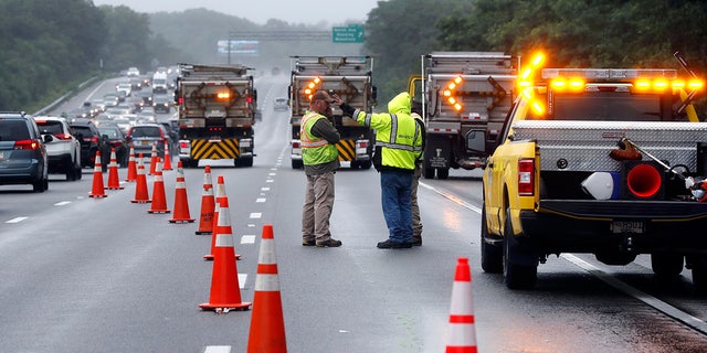 Traffic on Interstate 95 is being diverted in the vicinity of an hour-long standstill with a group of gunmen who partially turned off the highway, Saturday, July 3, 2021 in Wakefield, Massachusetts, Massachusetts.  Massachusetts police say nine suspects have been arrested.  .  (AP Photo / Michael Dwyer)