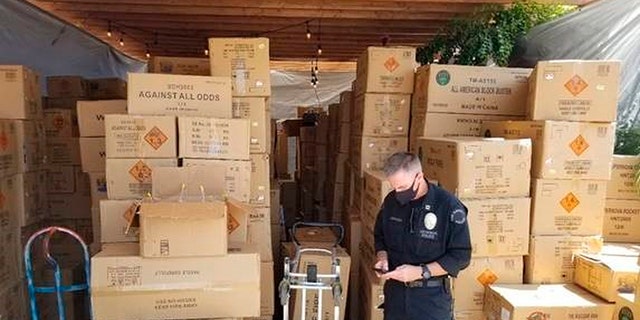 This July 2021 photo released by the ATF/United States Attorney's Office Central District of California, shows boxes of illegal large homemade fireworks explosives in South Los Angeles. Authorities found over 500 boxes of commercial grade fireworks in large cardboard boxes. (Associated Press)