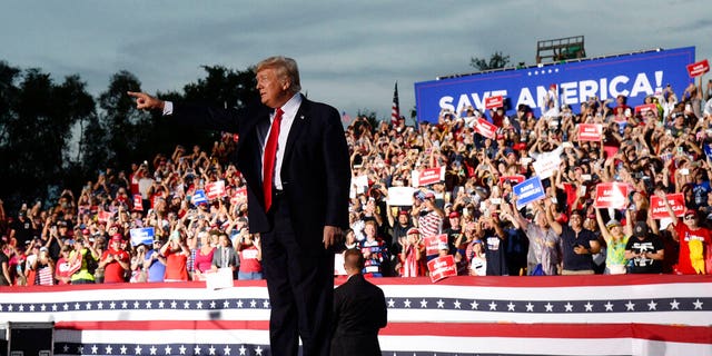 Former President Donald Trump walks on stage during a rally at the Sarasota Fairgrounds Saturday, July 3, 2021, in Sarasota, Fla. (AP Photo/Jason Behnken)