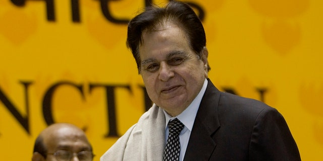 Veteran Bollywood actor Dilip Kumar, right, receives a Lifetime Achievement award at the 54th National Film Award ceremony in New Delhi, India on Sept. 2, 2008.  (AP Photo/Gurinder Osan, File)