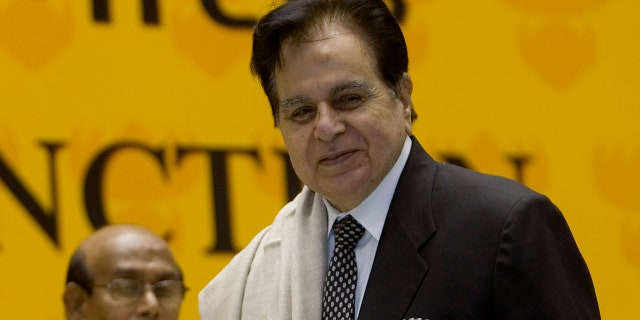 Veteran Bollywood actor Dilip Kumar, right, receives a Lifetime Achievement Award at the 54th National Film Award ceremony in New Delhi, India on September 2, 2008. (AP Photo / Gurinder Osan, File)