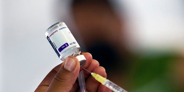 A health worker prepares to give an injection of the AstraZeneca COVID-19 vaccine during a vaccination campaign for people aged 30 to 39 in Mexico City on Wednesday, July 7, 2021. 