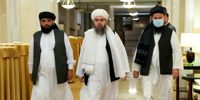Members of the Afghan Taliban movement political delegation Suhil Shaheen, left, Mawlawi Shahabuddin Dilawar, center, and Dr Mohammad Naim, arrive to attend a press conference in Moscow, Russia, Friday July 9, 2021 ( AP Photo / Alexander Zemlianichenko)