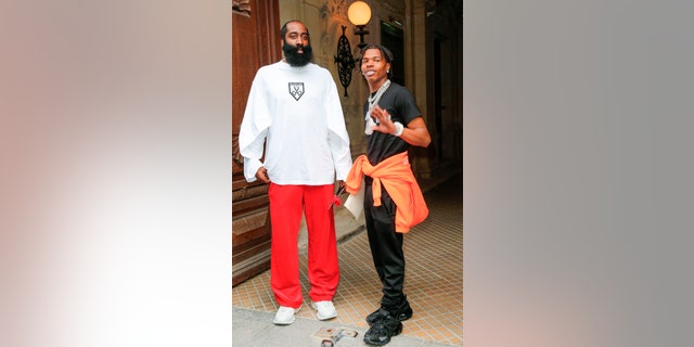 NBA player James Harden on the left and Lil 'Baby arrive at Balenciaga Haute Couture fall-winter 2021/2022 as part of Paris Fashion Week, Wednesday, July 7, 2021 in Paris.