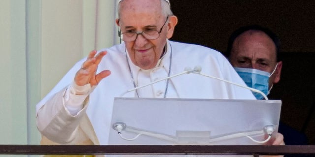Pope Francis appears on a balcony of the Agostino Gemelli Polyclinic in Rome, Sunday, July 11, 2021. (AP Photo/Alessandra Tarantino)