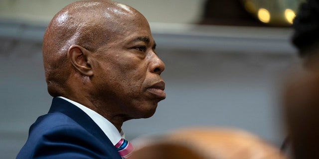 Brooklyn Borough President and New York City mayoral candidate Eric Adams listens as President Joe Biden speaks during a meeting on reducing gun violence, in the Roosevelt Room of the White House, Monday, July 12, 2021, in Washington. (AP Photo/Evan Vucci)