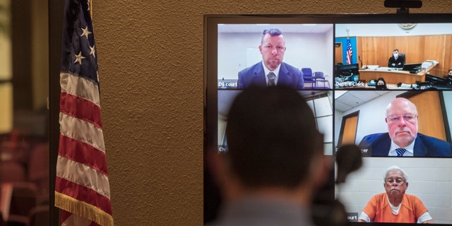 In this Thursday, April 15, 2021, file photo, defendants Paul Flores, top left, and his father, Ruben Flores, bottom right, appear via video conference during their arraignment in San Luis Obispo Superior Court in San Luis Obispo, Calif.