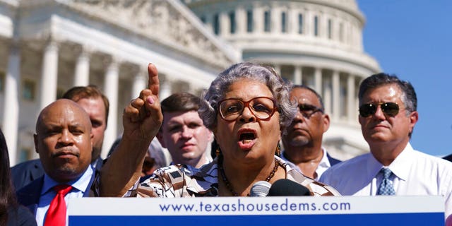 FILE - In this July 13, 2021, file photo Texas State Rep. Senfronia Thompson, dean of the Texas House of Representatives, speaks as Democratic members of the Texas legislature hold a news conference at the Capitol in Washington. Texas Democrats are starting a second week of holing up in Washington to block new voting laws back home. More than 50 Democrats in the Texas House of Representatives had plans Monday to continue on a media blitz in the nation's capital and pressure Congress to act on federal voting rights. (AP Photo/J. Scott Applewhite, File)