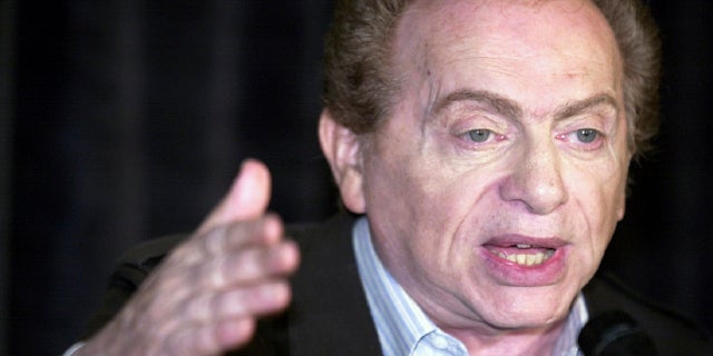 FILE - In this Wednesday, Aug 28, 2002, file photo, comic Jackie Mason addresses the media at Zanie's comedy club in Chicago about the club's decision to cancel comic Ray Hanania's appearance.