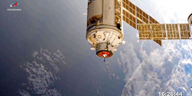 In this photo provided by the press service of the Roscosmos space agency, the Nauka module is seen before docking to the International Space Station on Thursday, July 29, 2021. The long-delayed Russian laboratory module successfully docked at the International Space Station Thursday, eight days after launching from the Russian space launch facility in Baikonur, Kazakhstan.  The 20 metric ton (22 ton) Nauka module, also known as the multipurpose lab module, docked at the orbiting outpost after a long journey and series of maneuvers.  (Photo by the Roscosmos Space Agency press service via AP)