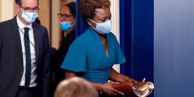 White House deputy press secretary Karine Jean-Pierre arrives for a news briefing at the White House in Washington, Friday, July 30, 2021. (Associated Press)