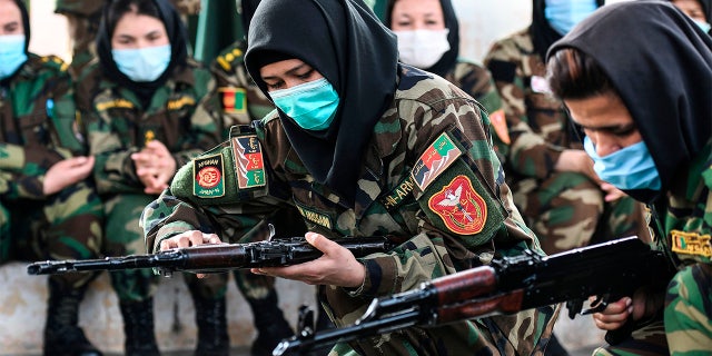 Afghan Women Carry Guns In Streets Protest Taliban As Country