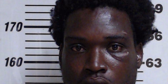 Police say Andrew Malik Jones, 28, was hiding inside a public bathroom before he brutally assaulted an Oklahoma woman in a stall.