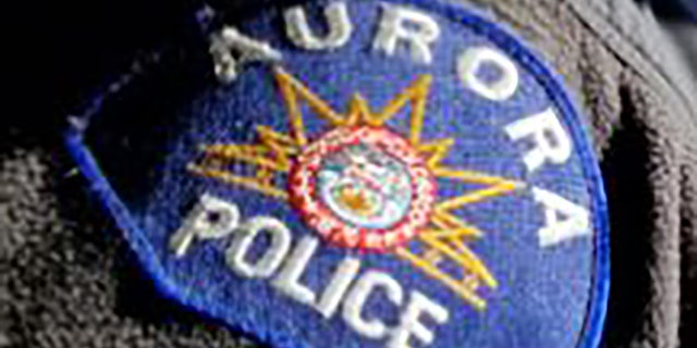 The Aurora Police Department said it issued the warrants for officers John Haubert and Francine Martinez