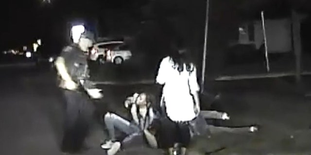Dashcam video appeared to show two suspects above the officer pinning him to the ground