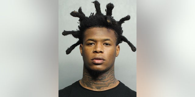 Avantae Williams, 20, was fired from the University of Miami Hurricanes football team on Thursday following his arrest involving his pregnant ex-girlfriend. 