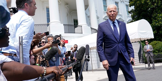 photo of President Biden and reporters