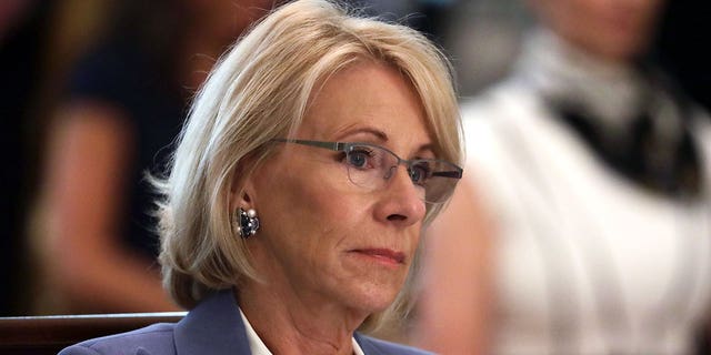 U.S. Secretary of Education Betsy DeVos listens during a cabinet meeting in the East Room of the White House on May 19, 2020 in Washington, DC.